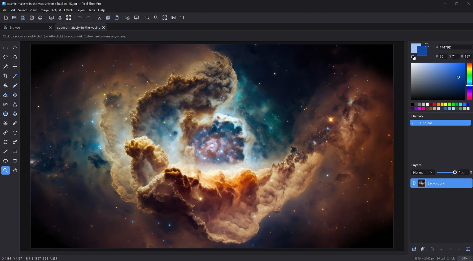 The Pixel Shop Pro editor with a nebula image open, the toolbox on the left and the color, history and layers panels on the right